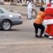 ‘Father Christmas’ And Warden Seen Controlling Traffic In Akure (Video)