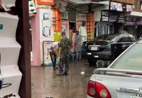 Soldier Forces Man to Mop Shopping Mall in Heavy Rain for Wearing Military Camouflage (Video)
