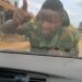 Driver Speeds Off With Soldier Hanging On The Bonnet After He Tried To Stop The Car (Video)