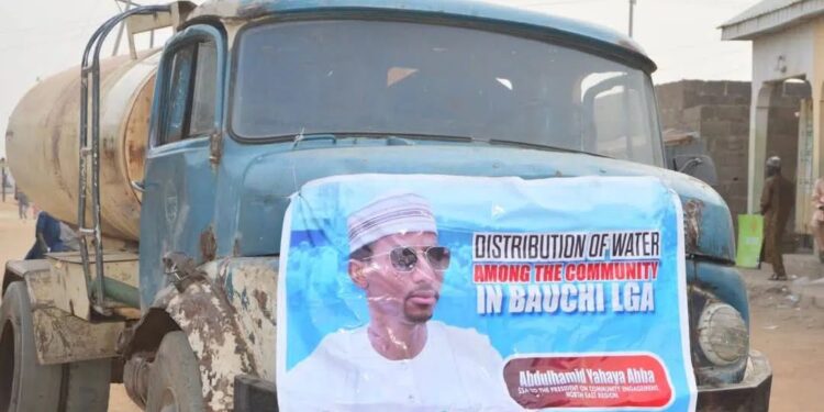 “Politicians Have Really Weaponised Poverty” – Nigerians Blast Presidential Aide Who Mounts Banner While Delivering Water By Tanker To Bauchi Residents