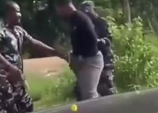 Nigerian Police Officers Seen In Viral Video As$@ulting Young Man (Watch)