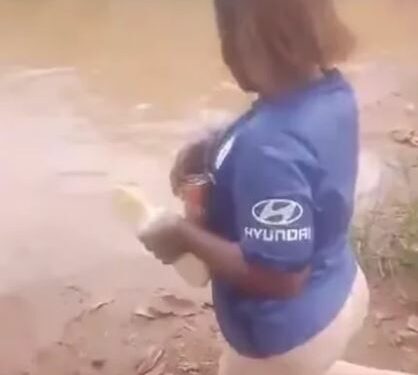 Young Woman Seen Invoking River God To K!ll Partner If He Dumps Her (Video)