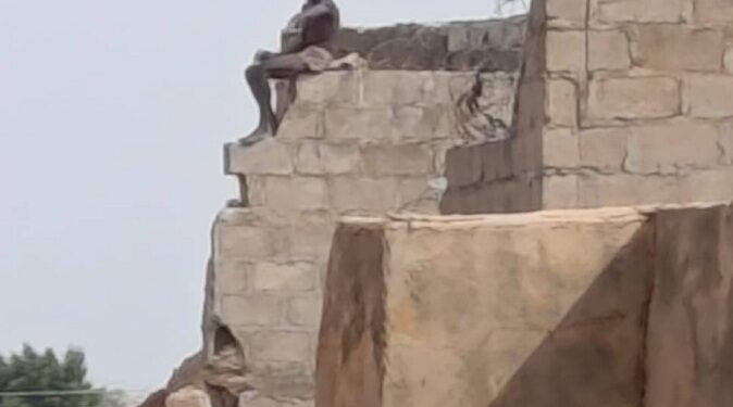 Katsina Man Climbs Building to Express Anger After His In-Laws Took His Wife Away (Video)