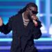 Burna Boy Kicks Couple Out of His Concert For Sleeping During His Performance (Video)