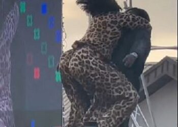 Singer Timaya Falls On Stage While Trying To Lift Plus-Sized Woman During Performance (Video)
