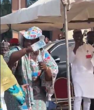 Outrage As Nigerians React To Video Of APC Member Spraying Naira During Tinubu’s Adamawa Visit (Watch)