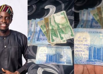 “My Name Is Faith And I’m Into Prostitution, I’m Available” – Man Cries Out, Displays Unusual Writeup With Phone Number On ₦1,000 Note